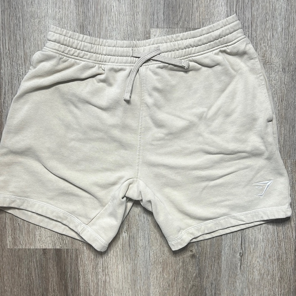 Cream Gymshark shorts. Size Medium